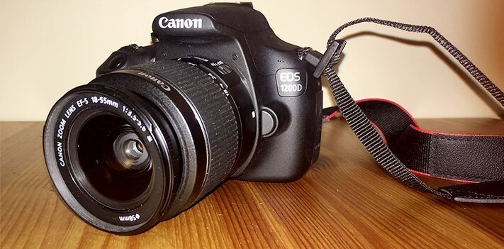 How to put strap on canon camera? 1
